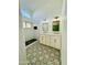 Spa-like bathroom with a walk-in shower, double vanity, and patterned floor at 5984 W Geronimo Ct, Chandler, AZ 85226