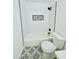 Updated bathroom with white subway tile, new vanity, and modern fixtures at 5984 W Geronimo Ct, Chandler, AZ 85226