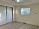 Spacious bedroom with large closet and window at 11411 N 91St Ave # 217, Peoria, AZ 85345
