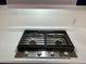 Stainless steel Samsung gas cooktop with four burners at 11411 N 91St Ave # 217, Peoria, AZ 85345