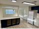 Kitchen with dark blue cabinets and gas range at 11411 N 91St Ave # 217, Peoria, AZ 85345