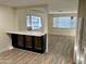 Kitchen with dark blue cabinets and quartz countertops at 11411 N 91St Ave # 217, Peoria, AZ 85345