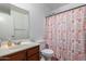 Clean bathroom with shower/tub and updated vanity at 8714 W Heber Rd, Tolleson, AZ 85353