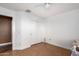 Small bedroom with tile flooring and double door closet at 8714 W Heber Rd, Tolleson, AZ 85353