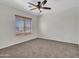 Bedroom with ceiling fan and window blinds at 8312 W Pioneer St, Tolleson, AZ 85353