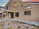 Two story house with backyard access and covered patio at 8312 W Pioneer St, Tolleson, AZ 85353