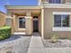 Covered front entry with a decorative door at 8312 W Pioneer St, Tolleson, AZ 85353