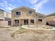 Two story house with backyard access and covered patio at 8312 W Pioneer St, Tolleson, AZ 85353