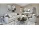 Living room with neutral decor and dining area at 8312 W Pioneer St, Tolleson, AZ 85353