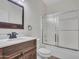 Bathroom boasts a vanity with a large mirror and a shower/tub combo at 8312 W Pioneer St, Tolleson, AZ 85353