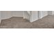 Unfinished basement area with carpet at 8312 W Pioneer St, Tolleson, AZ 85353