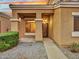 Covered front entry with a decorative door at 8312 W Pioneer St, Tolleson, AZ 85353