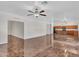 Spacious living room with tile floors and kitchen view at 8312 W Pioneer St, Tolleson, AZ 85353