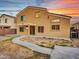 Two-story house back, showcasing a walkway to the back patio at 8312 W Pioneer St, Tolleson, AZ 85353