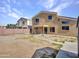 Two story house with backyard access and covered patio at 8312 W Pioneer St, Tolleson, AZ 85353