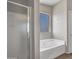 Bathroom with shower and garden tub at 8312 W Pioneer St, Tolleson, AZ 85353