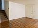 Living room with tile floor and neutral walls at 3416 N 44Th St # 5, Phoenix, AZ 85018