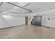 Spacious garage with epoxy flooring and ample storage at 1553 E Zion Way, Chandler, AZ 85249