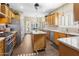 Spacious kitchen with granite counters and wood cabinets at 38065 N Cave Creek Rd # 4, Cave Creek, AZ 85331