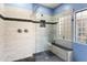 Spa-like bathroom with glass shower, built-in seat, and stylish tile at 38065 N Cave Creek Rd # 4, Cave Creek, AZ 85331
