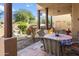 Relaxing patio with seating area, fountain, and built-in grill at 38065 N Cave Creek Rd # 4, Cave Creek, AZ 85331