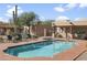Inviting community pool with ample lounge chairs for relaxation at 38065 N Cave Creek Rd # 4, Cave Creek, AZ 85331