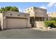 Southwest style home with attached garage and desert landscaping at 38065 N Cave Creek Rd # 4, Cave Creek, AZ 85331