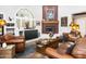 Cozy living room with fireplace, hardwood floors, and southwestern decor at 38065 N Cave Creek Rd # 4, Cave Creek, AZ 85331