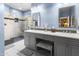 Bathroom with double vanity and walk-in shower at 38065 N Cave Creek Rd # 4, Cave Creek, AZ 85331