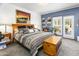 Main bedroom with access to patio at 38065 N Cave Creek Rd # 4, Cave Creek, AZ 85331
