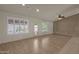 Bright living room with hardwood floors and neutral walls at 10910 E Oro Ave, Mesa, AZ 85212