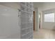 Walk-in shower with glass block wall at 10910 E Oro Ave, Mesa, AZ 85212