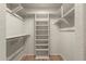 Walk-in closet featuring shelves and rods at 10910 E Oro Ave, Mesa, AZ 85212