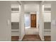 Spacious walk-in closet with shelving and hanging rods at 10910 E Oro Ave, Mesa, AZ 85212