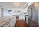 Sleek kitchen with stainless steel appliances and granite island at 4422 N 75Th St # 4011, Scottsdale, AZ 85251