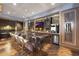 Modern bar with a granite countertop and stylish shelving at 4422 N 75Th St # 4011, Scottsdale, AZ 85251