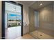 Bathroom with glass shower and access to private balcony at 4422 N 75Th St # 4011, Scottsdale, AZ 85251