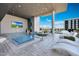 Resort-style pool with lounge chairs and a TV at 4422 N 75Th St # 4011, Scottsdale, AZ 85251
