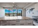 Modern kitchen with granite countertop and city view at 4422 N 75Th St # 4011, Scottsdale, AZ 85251