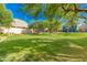 Community green space with lush grass and mature trees at 2402 E 5Th St # 1481, Tempe, AZ 85288