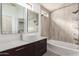 Bathroom with modern vanity, soaking tub and tile shower at 2402 E 5Th St # 1481, Tempe, AZ 85288