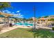 Inviting community pool with ample lounge chairs and shade at 2402 E 5Th St # 1481, Tempe, AZ 85288