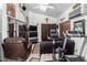 Home gym with treadmill, exercise bike, and ample space at 5839 E Jensen St, Mesa, AZ 85205