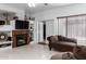 Gathering room with fireplace, built-in shelving, and comfortable seating at 5839 E Jensen St, Mesa, AZ 85205