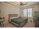 Guest bedroom with a queen-size bed and large windows at 17808 N 57Th Pl, Scottsdale, AZ 85254