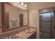 Bathroom with double vanity and separate shower at 17808 N 57Th Pl, Scottsdale, AZ 85254