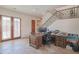 Home office features built-in shelving, a large desk, and French doors at 17808 N 57Th Pl, Scottsdale, AZ 85254