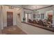 Elegant entryway with a wood door and decorative tile flooring at 17808 N 57Th Pl, Scottsdale, AZ 85254