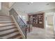 Home office with built-in bookcases and a large desk at 17808 N 57Th Pl, Scottsdale, AZ 85254