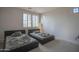 Well-lit bedroom with two twin beds and ample floor space at 17808 N 57Th Pl, Scottsdale, AZ 85254